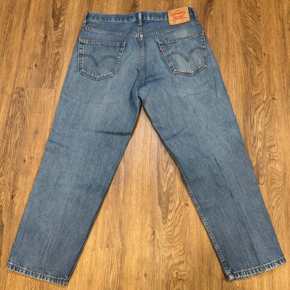 Levis 550 Relaxed Fit Mens Blue Jeans Medium Wash Tapered Leg 34x29 Denim Pants